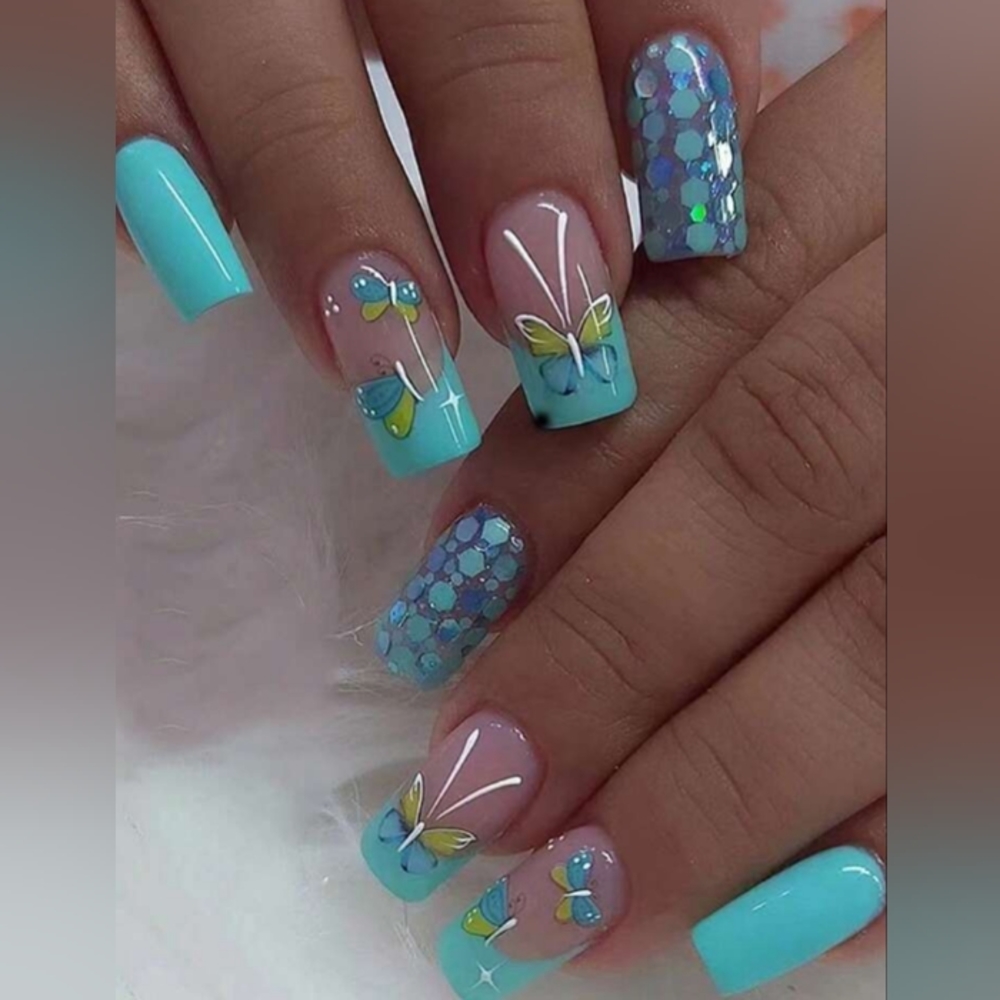 Butterfly and speckled Blue Nails.